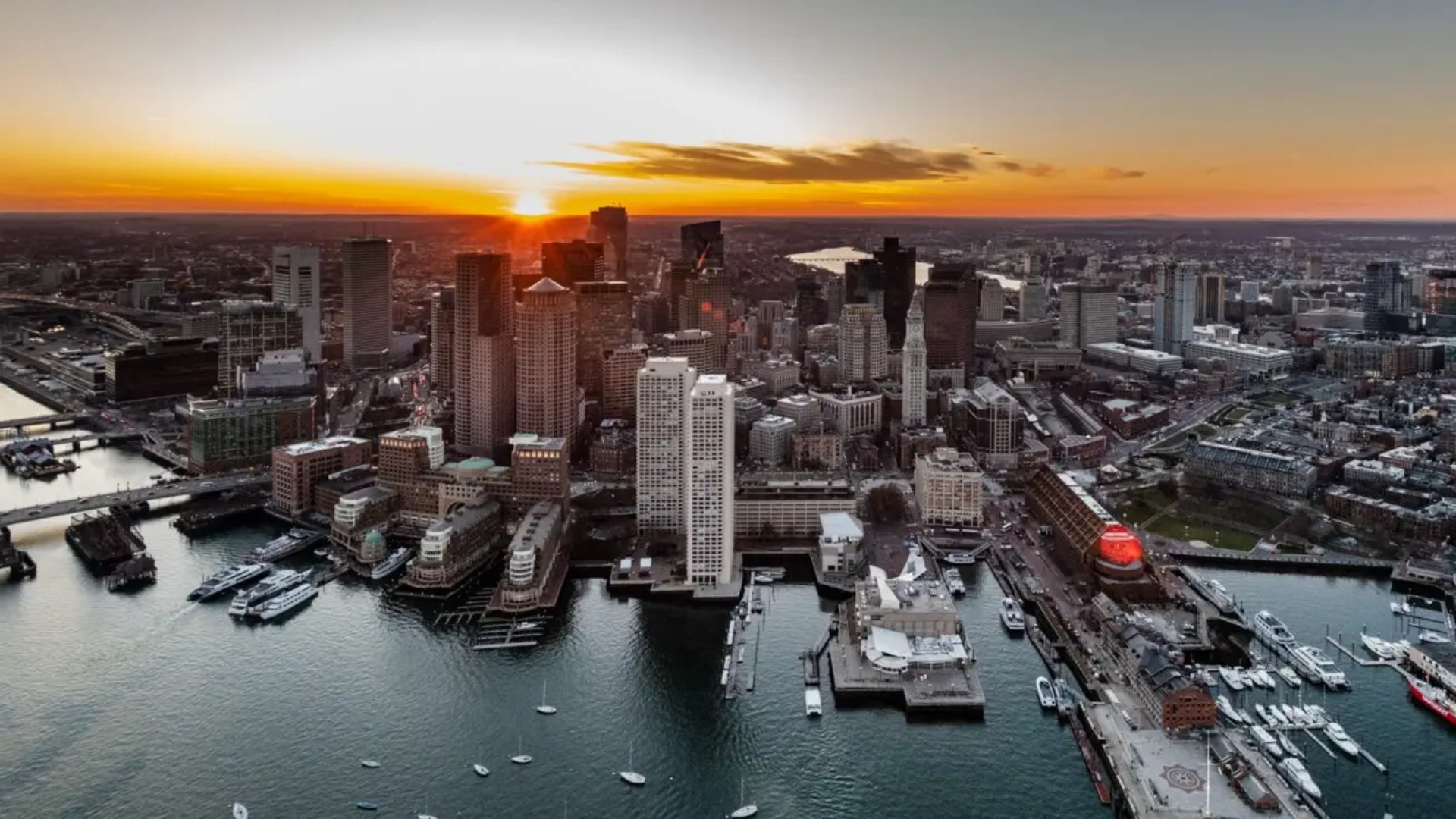 downtown-boston-skyline-from-helicopter-tour-during-sunset