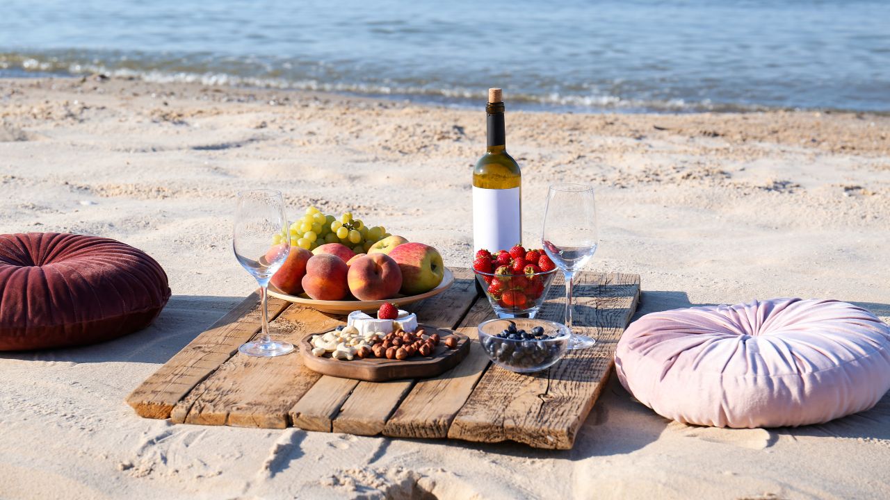 a picnic set up on a beach in Cape Cod
