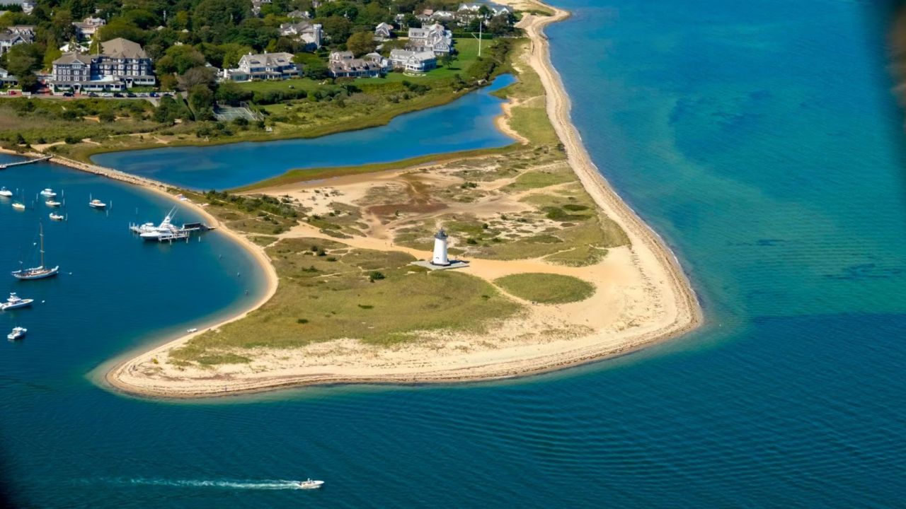 Stunning aerial view of the Great point light house 
