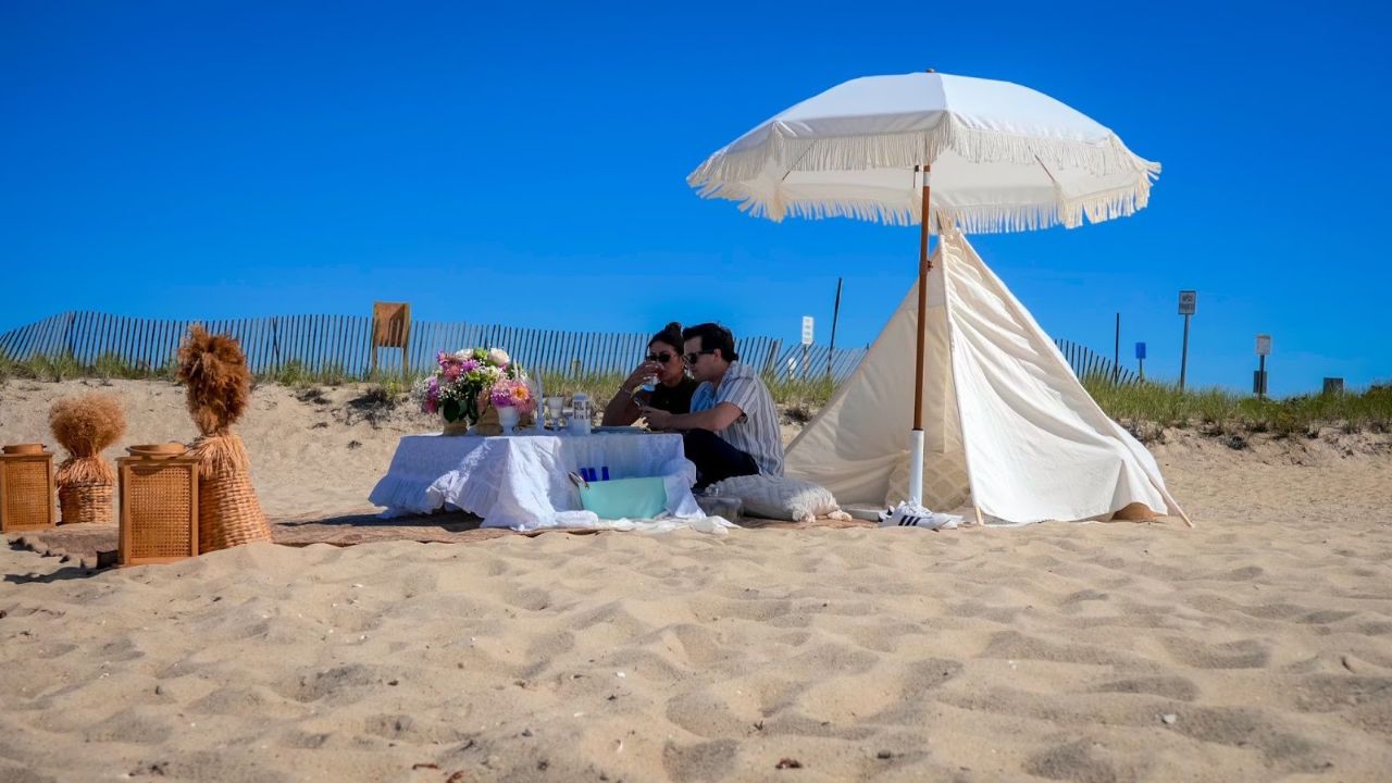 Couple enjoying their stay at the beach in Nantucket 

