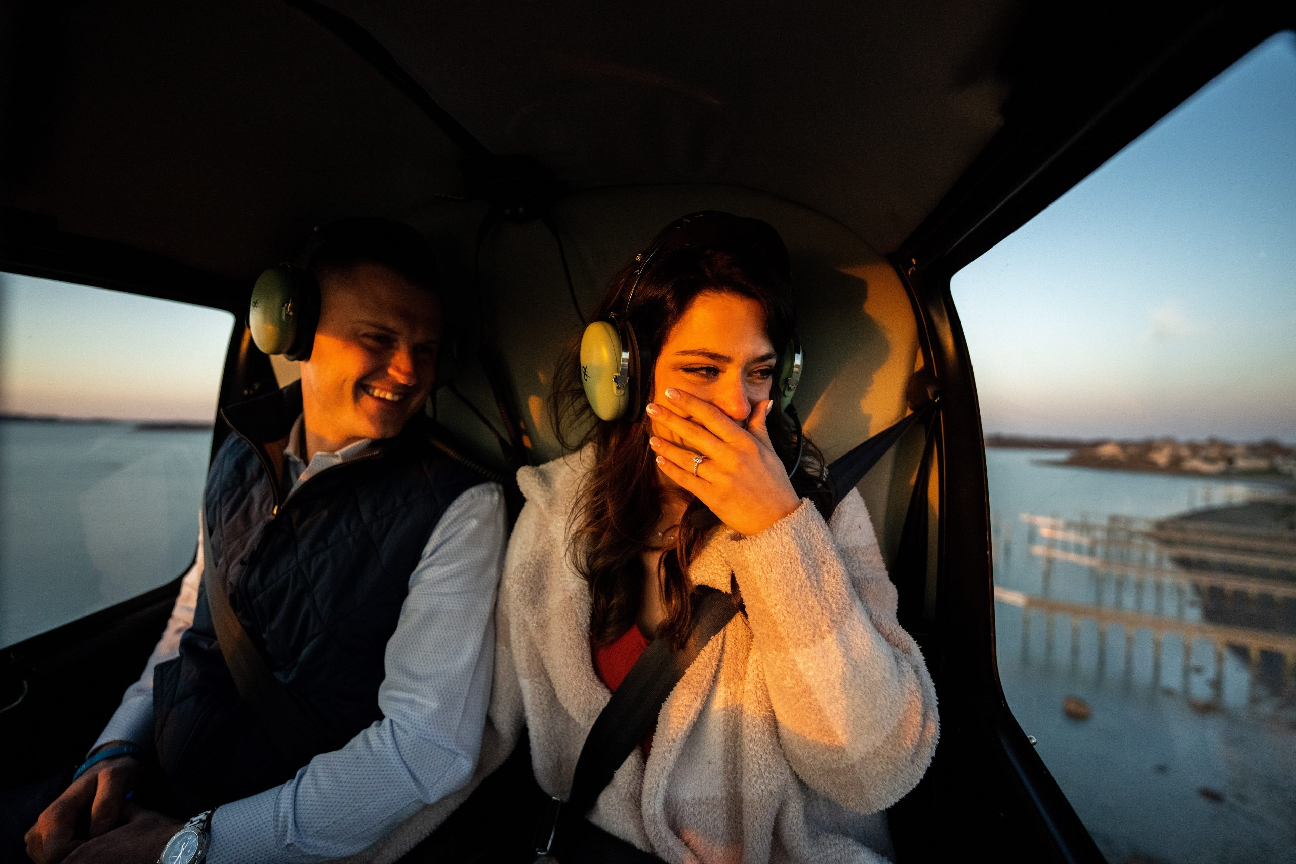 couples enjoying their private charter service while enjoying the sunset